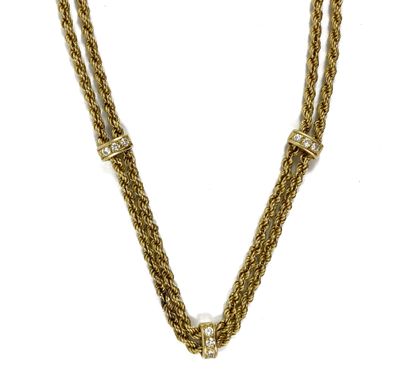 null NECKLACE composed of two interlaced chains punctuated with three half cylinders...