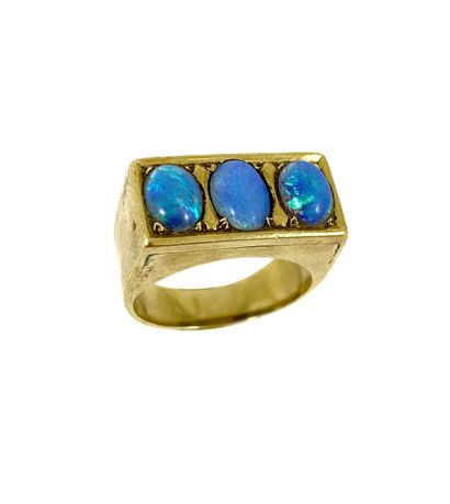 null HORSE adorned with a rectangular tray composed of three blue opals cabochon....