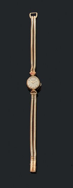 null JEAGER LECOULTRE WATCH adorned with a round dial, white background, stick indexes...