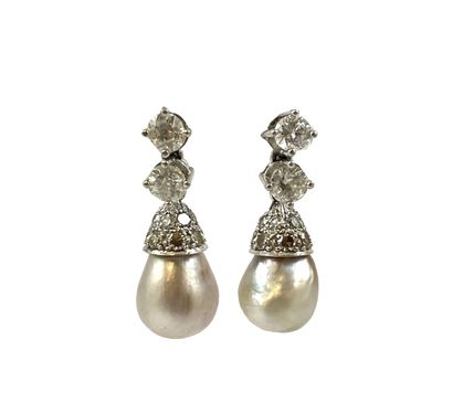 null PAIR OF EARRINGS holding a pear-shaped gray pearl (untested) held by a cap paved...