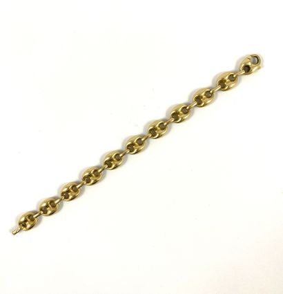 null BRACELET decorated with a coffee bean mesh. Mounting in 18K yellow gold. Length...
