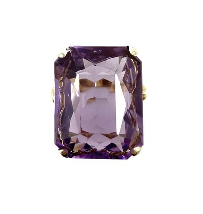 null RING adorned with a rectangular amethyst of 13 carats. Mounting with interlacing...