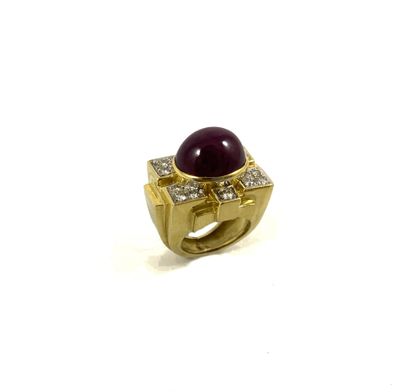 null 1940's RING holding a cabochon of ruby in a geometric setting paved with brilliant-cut...