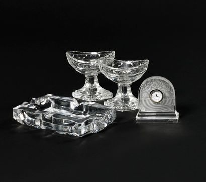  LOT OF BACCARAT including: A clock (Height: 8 cm -Length: 7 cm- Depth: 2,5 cm) and...
