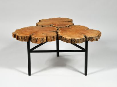 null WORK OF THE 1960's Low table with a tray made of three wooden logs assembled...