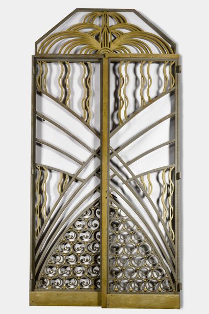 null WORK OF THE 1930's Suite of four wrought iron doors with two openwork panels...