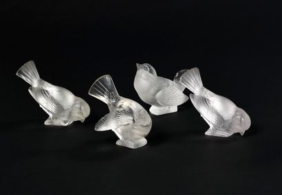 null 
RENE LALIQUE

Suite of four sparrows in frosted pressed glass

Three different...