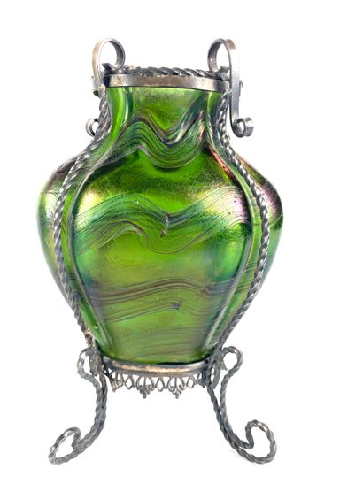 null Attributed to LOETZ Curved vase with straight neck in iridescent wavy glass...