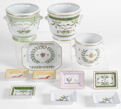 null PORCELAIN OF LIMOGES, hand painted by Laure SELIGNAC. - Two small flowerpots,...