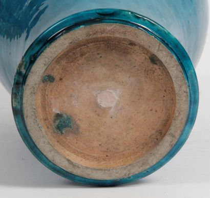  CHINA, 19th CENTURY Turquoise enameled porcelain vase. (Base broken, neck cut, lid...