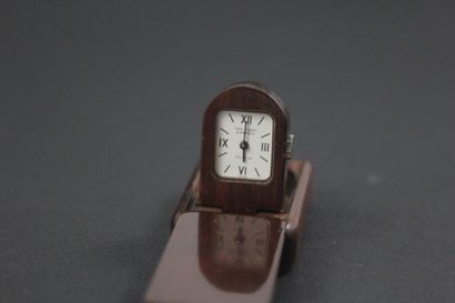 null VAN CLEEF & ARPELS About 1980. N° 4509. Wooden bag watch. Stick indexes and...