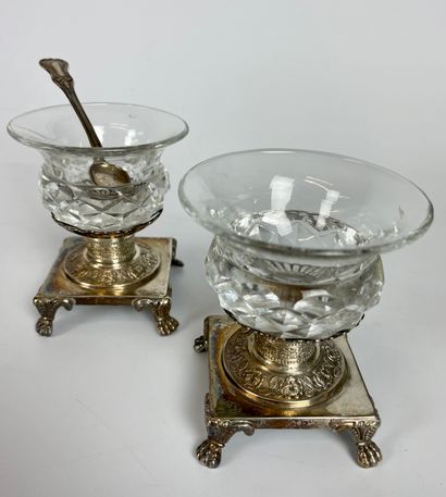 null PAIR OF SALTERONS in cut crystal the square silver base with claw feet. And...