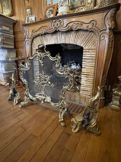 null PAIR OF FIREPLACES in ormolu and patina decorated with cherubs warming up. A...