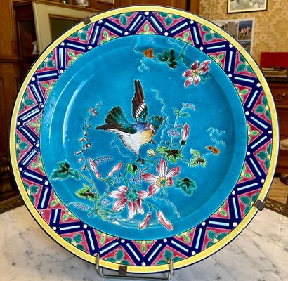 null LONGWY Two large enameled earthenware dishes with polychrome decoration of birds...