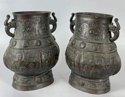 CHINA Pair of vases with handles in patinated...