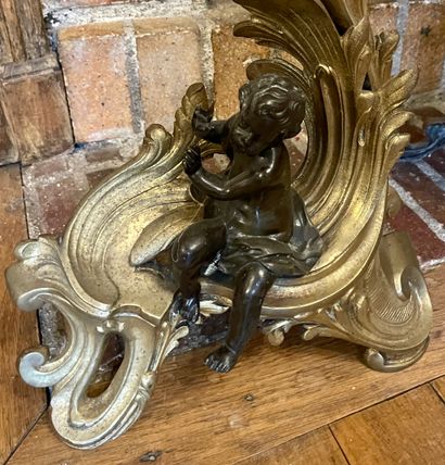 null PAIR OF FIREPLACES in ormolu and patina decorated with cherubs warming up. A...