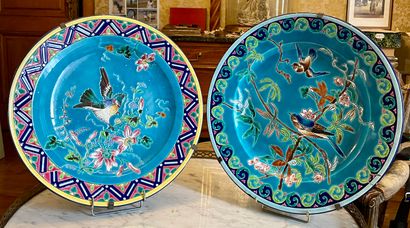 null LONGWY Two large enameled earthenware dishes with polychrome decoration of birds...