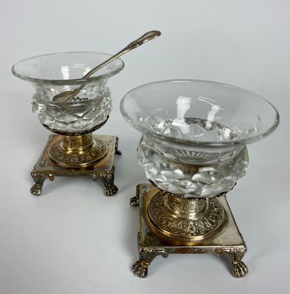 null PAIR OF SALTERONS in cut crystal the square silver base with claw feet. And...