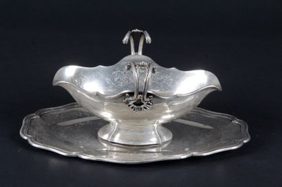 null SAUCIERE AND ITS FIXED PLATE, IN SILVER with 950 thousandth. With decoration...