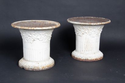 null TWO cast iron garden basins. White lacquered. Decorated with friezes of foliage,...