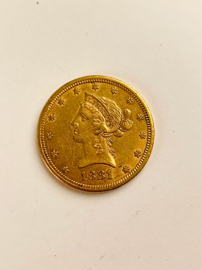 1 PIÈCE de 10 dollars, US, or, 1881. Poids : 16.74 gr.