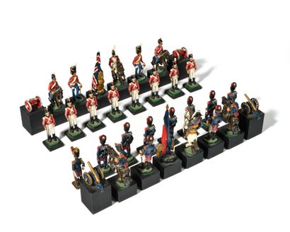 Ensemble de 32 pièces de jeu d’échec napoléonien....