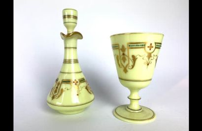 null WATER GLASS

in yellow opaline glass and gilded decoration including :

- a...