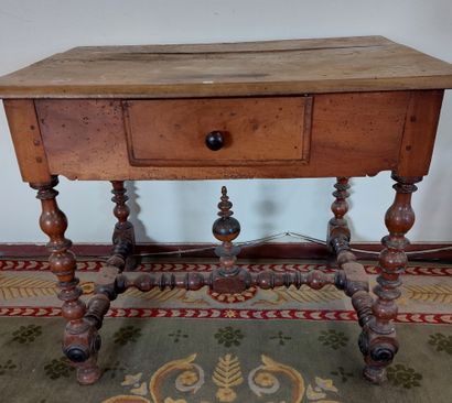 null TABLE LOUIS XIII in natural wood opening on a drawer. Legs and spacer in toupie.

H...