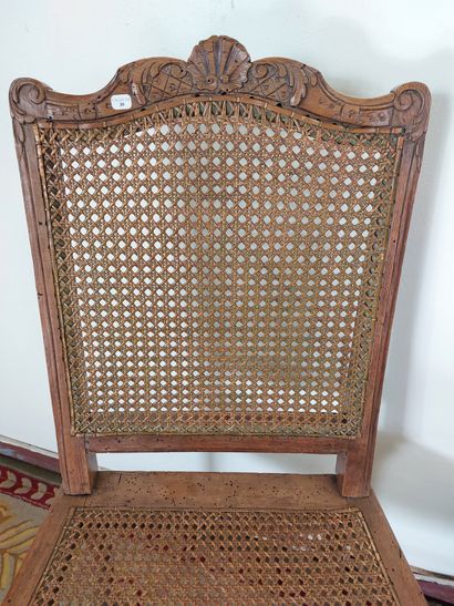 null TWO CANE CHAIRS 18th century. The first one has a spacer with moving patterns....