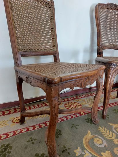 null TWO CANE CHAIRS 18th century. The first one has a spacer with moving patterns....