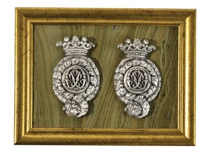 PAIR OF BOSSES OF BITS. 
In silver plated...