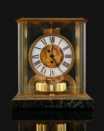 null 
JAEGER LECOULTRE Atmos. About 1960. Atmospheric clock in gilded metal of cubic...