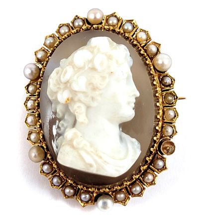 A cameo with a profile of a woman on agate...