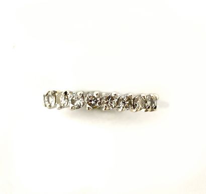 null ALLIANCE composed of twenty two brilliant cut diamonds. Mounting in 18K white...