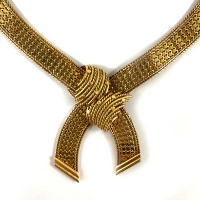 null NECKLACE composed of a flat mesh with geometric design holding a knot composed...