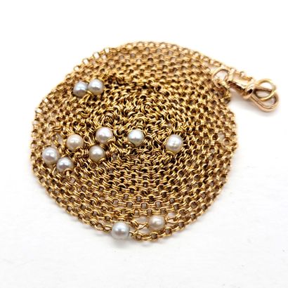 null SAUTOIR decorated with a round mesh punctuated with white pearls (not tested)....