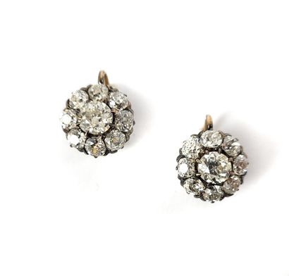 null 
PAIR OF EARRINGS 

decorated with a flower design paved with old-cut diamonds...