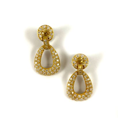 PAIR OF EARRINGS holding a drop shape paved...