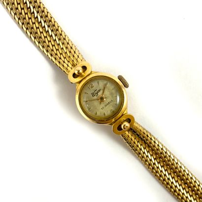null WATCH holding a round dial, stick index. Flexible bracelet rice grain mesh....