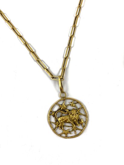 NECKLACE holding a circular pendant featuring...