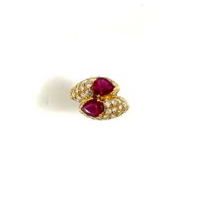 null TOI & MOI RING set with two pear-shaped rubies in a pavement of brilliant-cut...