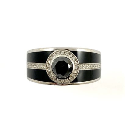 null MAUBOUSSIN "L'œuvre noire" ring set with a central black diamond weighing approximately...