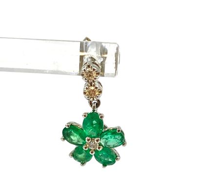 PAIR OF EARRINGS adorned with a flower paved...