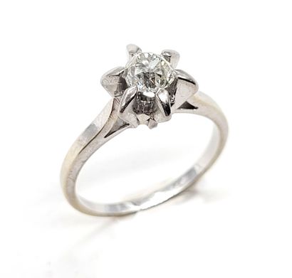 null RING holding an old cut diamond of 0.45 carat approximately. Mounted in 18K...