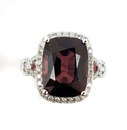 null RING holding a 7.45 carat cushion spinel in a brilliant-cut diamond setting....