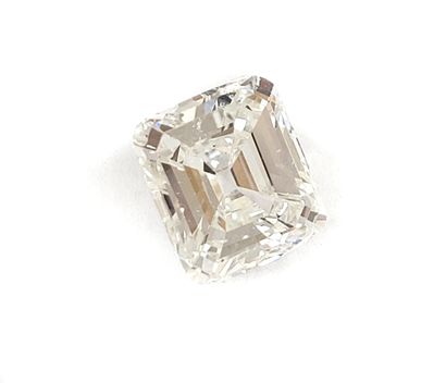 null Emerald cut diamond on paper of 3.26 carats. It is accompanied by its 18K white...