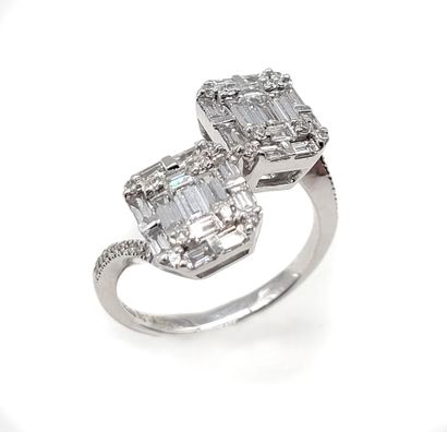 null TOI & MOI RING holding two rectangles paved with brilliant-cut and baguette...