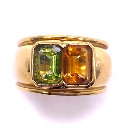 null JONC RING holding in its center a peridot and a citrine rectangular. Mounted...