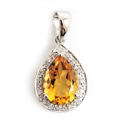 null PENDANT holding a pear-shaped citrine weighing approximately 1.60 carats in...