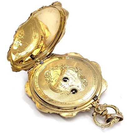 null 
POCKET WATCH

decorated with a round dial, Roman numerals. In the center an...